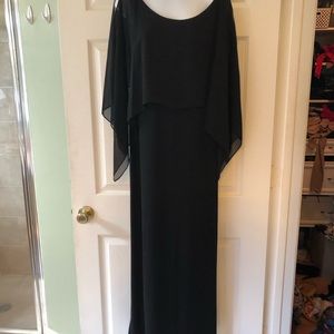 Elegant black dress with sheer overlay
